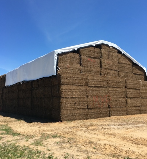 Farm Tender "Prime" Ag Centre selling new Inland Performer Hay Tarps